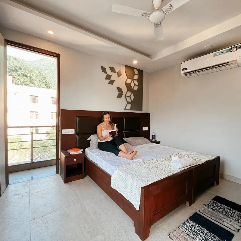 Student reading in a quiet air-conditioned room at the festival